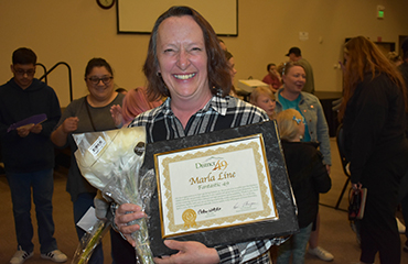  EES staff member receives a Fantastic 49 award.